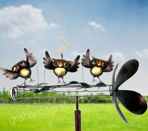 Dancing owls whirligig - dancing,